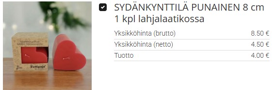 Punainen sydänkynttilä lahjalaatikossa